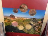 an image of a box of coins with a picture of a star on it