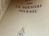 an open book with a picture of a woman on it