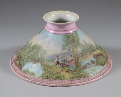 a vase with a painting on it sitting on a table