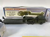a toy truck and a box of boxes on a table