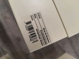 a white box with a barcode on it sitting on a table