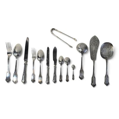 a lot of silverware on a white surface