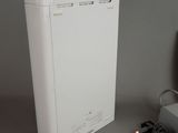 an image of a white box with a charger on it