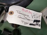 a tag on a piece of paper that is attached to a machine