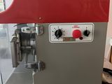 a machine that is sitting on a counter in a kitchen