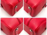 four photos of four red leather bags with handles and handles