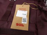 a brown bag with a tag attached to it