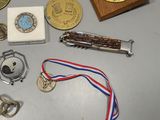 a table with medals and other items on it
