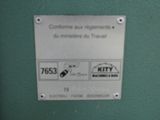 a sign on a green wall that says it is important to use the machine