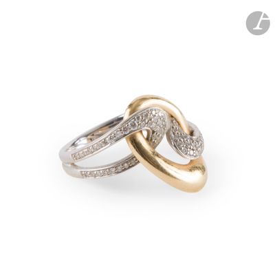 an image of two gold and silver rings on a white background