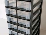 an image of a stack of plastic drawers on a table