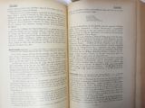 an open book that is sitting on a table