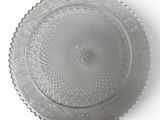 a glass plate with a star on it on a white surface