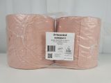 two rolls of pink toilet paper sitting on top of a white table