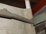 a close up of a metal handle on a piece of fabric
