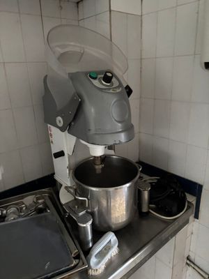 an image of a kitchen with a mixer on the counter