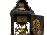 a clock that is sitting on top of a table