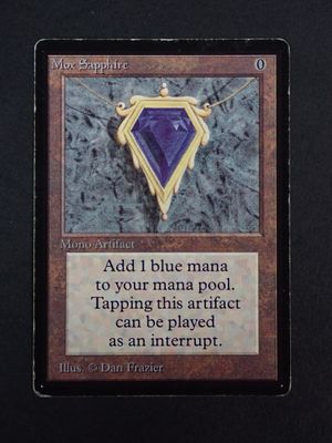 a close up of a card with a picture of a purple diamond on it