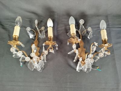 pair of crystal and brass sconces with flowers and leaves