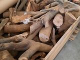 a wooden box filled with logs and logs