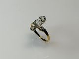 an image of a diamond ring on a white surface
