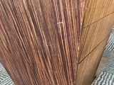 a close up of a piece of wood on a table