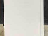 an image of a white refrigerator with a blue sticker on the door