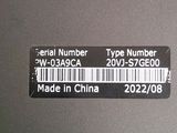 a label on the back of a laptop that says serial number