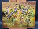 a picture of a painting on an easel with a blue background