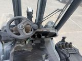 a close up of a steering and steering wheel on a forklift