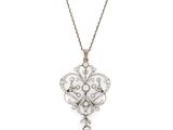 un pendentif en or blanc et diamants, orné d'un motif floral
