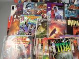 a lot of comic books that are on the table