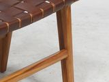 an image of a small stool made of wood and leather
