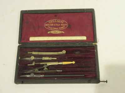 a box with a set of tools in it on a table