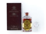 an image of a bottle of liquor sitting next to a box
