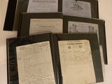a lot of papers that are on a table