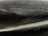 a close up of a purse with a zipper on it