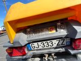 a close up of the back end of a motorcycle with a license plate on it