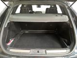 a trunk of a car with the back seats folded down