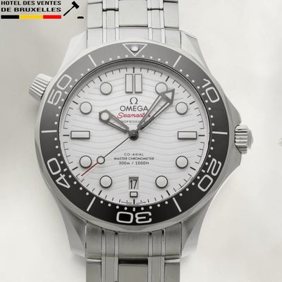 a close up of a watch on a white background