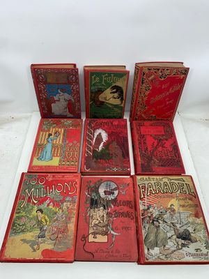 a bunch of books sitting on top of each other on a table