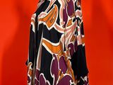 an image of a woman ' s shirt on a mannequin