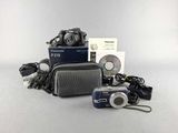 an image of a camera and other electronics on a table