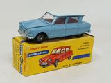 a blue toy car sitting on top of a yellow box