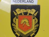 a badge on the back of a car that says nederland