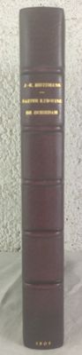 a brown book that is sitting on a table