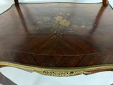 a wooden table with a mirror on top of it