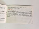 an open book with a picture of a cat on it