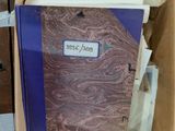 a box with a book inside of it on a table