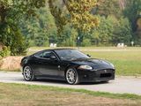 a black sports car parked on the side of the road